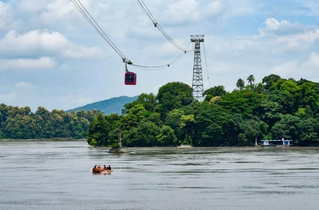 Passengers travelling in Indias longest river ropeway connecting Guwahati and North Guwahati over the River Brahmaputra.