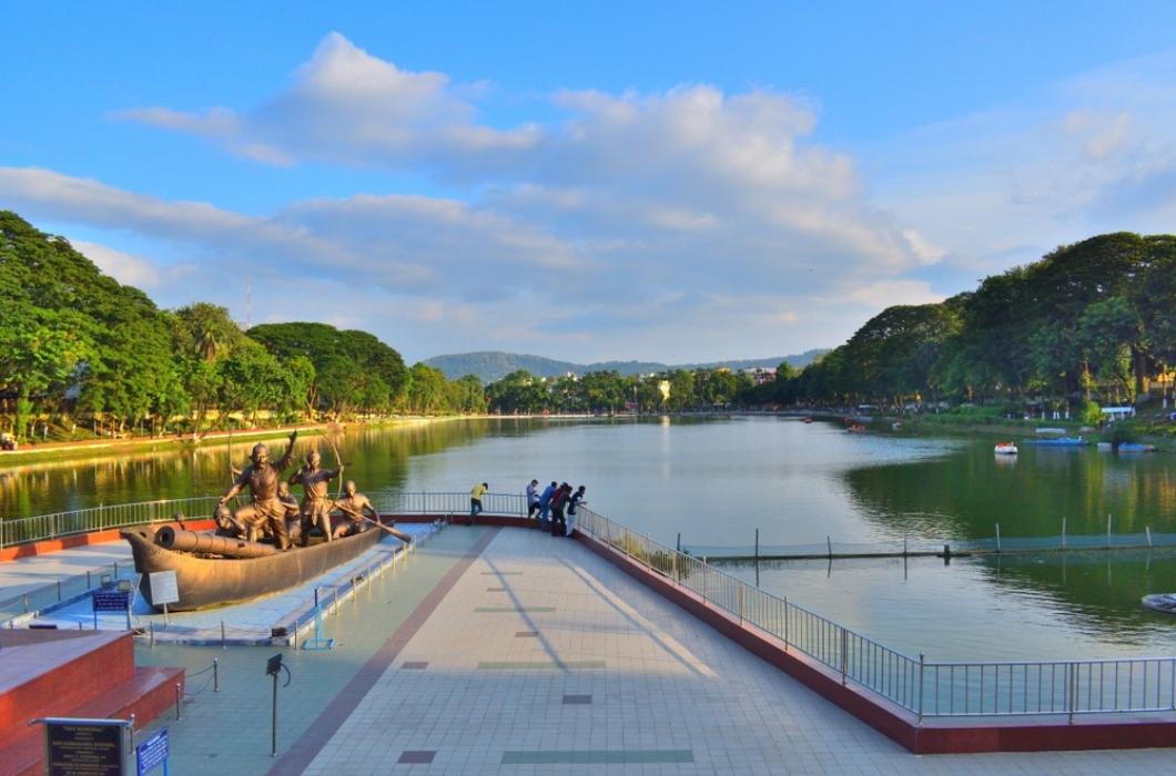 People visiting Lachit Borphukan statue at Dighalipukhuri lake in Guwahati.