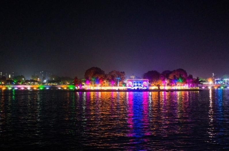 Beautiful and colorful lights reflected in the water of kankaria lake Ahmedabad.