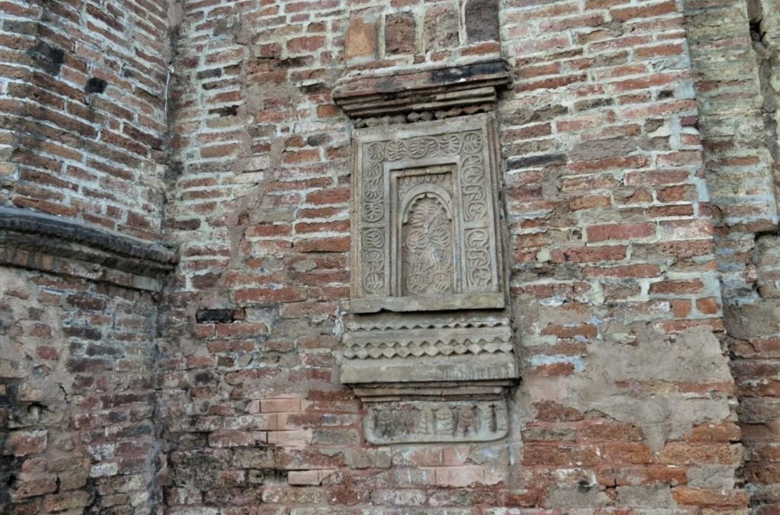 Detail on the brick wall of an ancient structure at the archaeological site of the Kachari ruins in Dimapur.