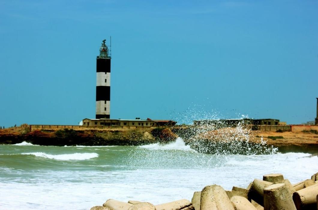 Lighthouse Overlooking The Ocean In Dwarka, India From The State Of Gujarat.