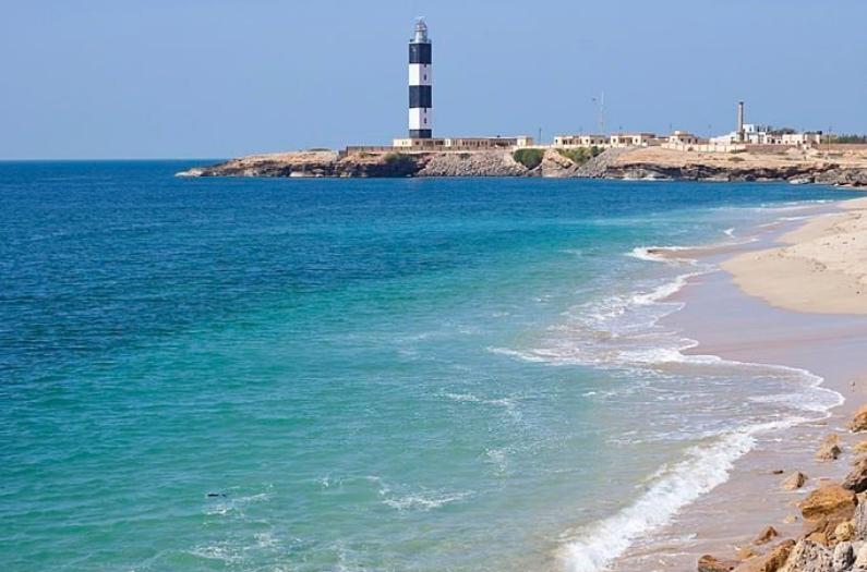 Lighthouse Overlooking The Ocean In Dwarka.