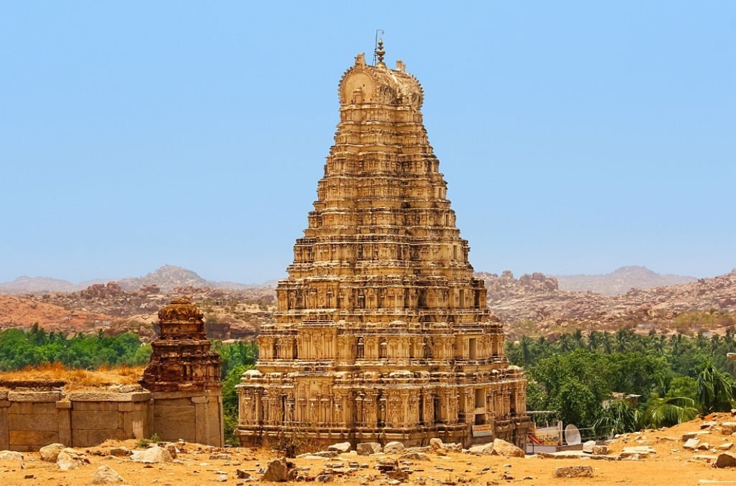 Photo of the landmark Virupaksha Temple also known as Pampapathi Temple in Hampi, Karnataka, India. It is part of the Group of Monuments at Hampi, designated a UNESCO World Heritage Site.