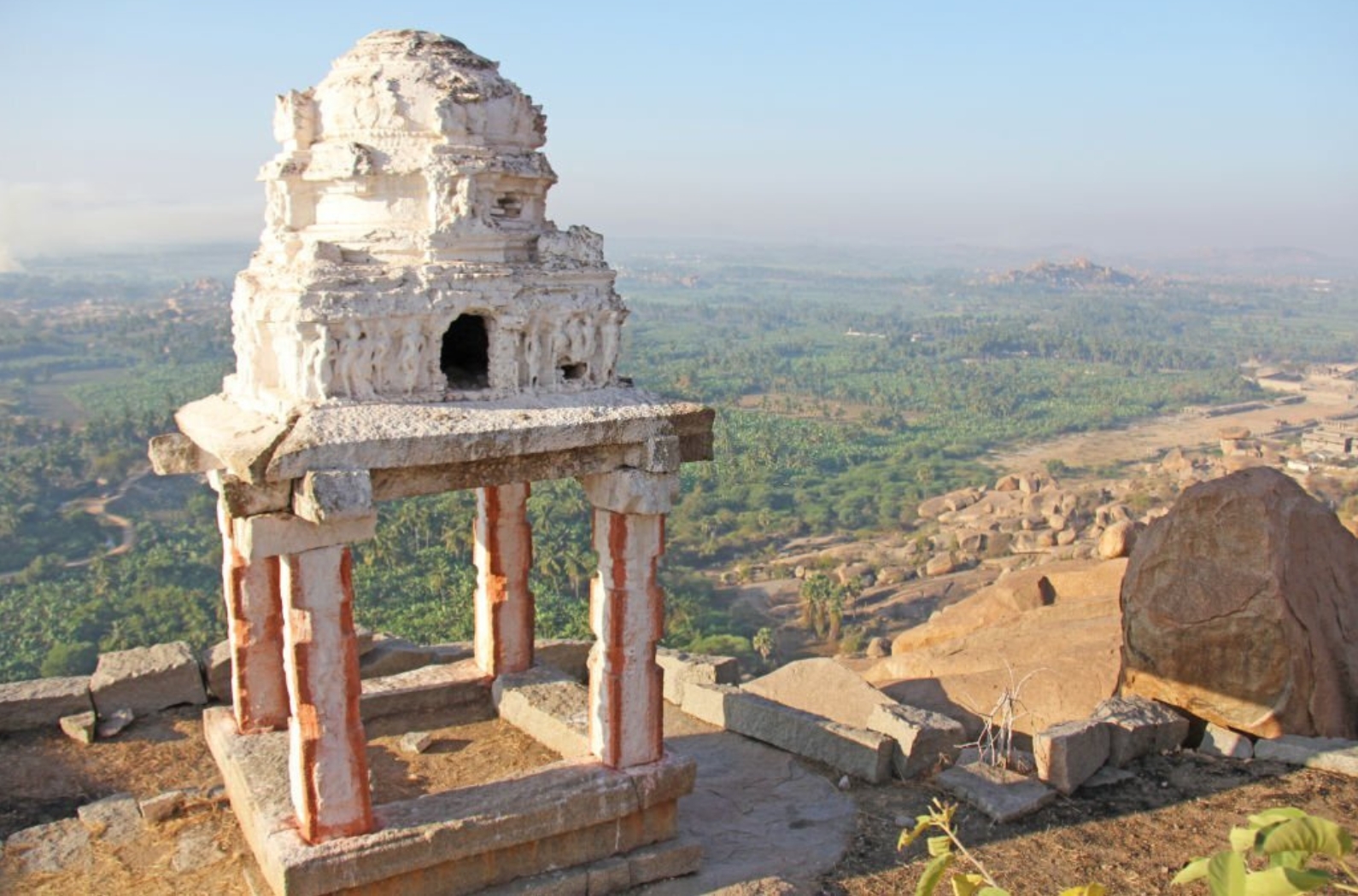 Sunrise in Hampi on Matanga hill. View from above, from the sky, aerophoto. Indian temple Hampi in the sun.