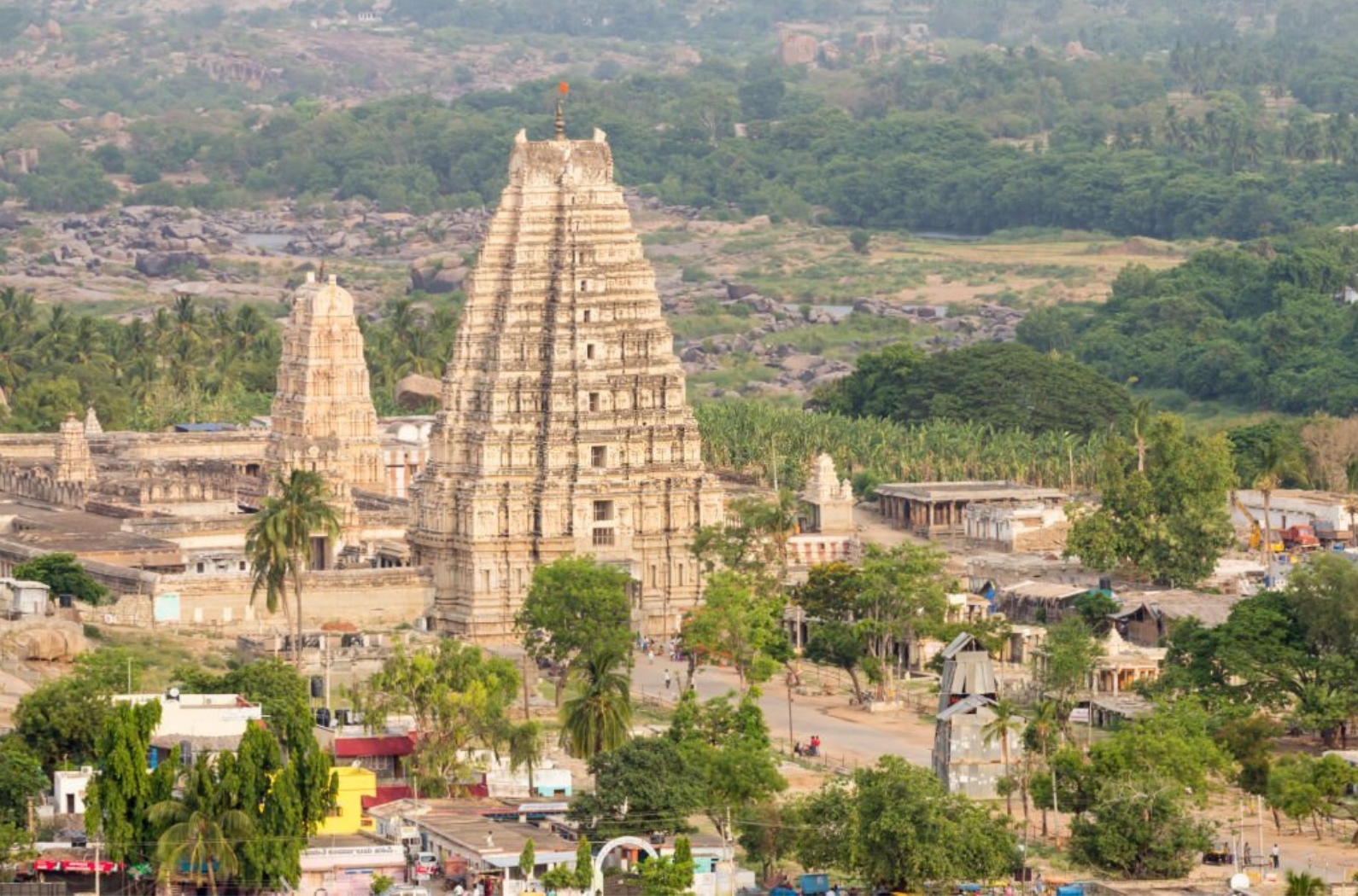 Top view of the ancient Virupaksha temple in Hampi. Dedicated to Lord Shiva, it is the oldest and main temple at Hampi, which lies on the banks of the Tungabhadra River in the ruins of the ancient city of Vijayanagar, capital of the.