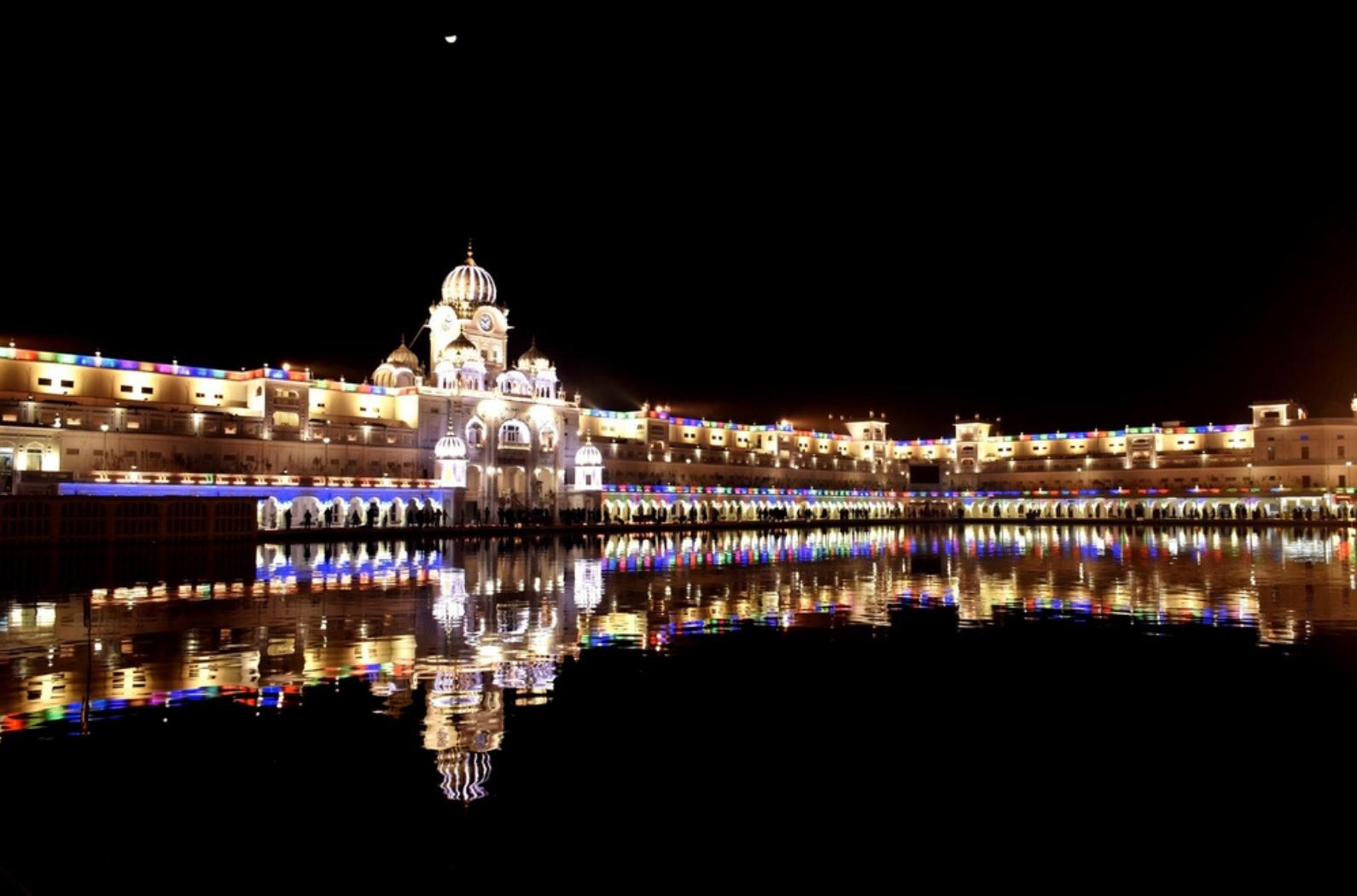 Beautiful night view of Akal Takht. Holy shrine of the Sikhs radiates brilliance.