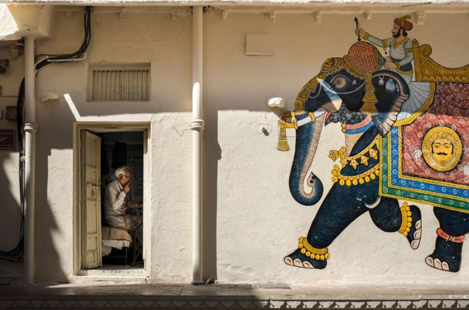 Mural painting of the Maharaja and his royal elephant at inner court of Udaipur's city palace.