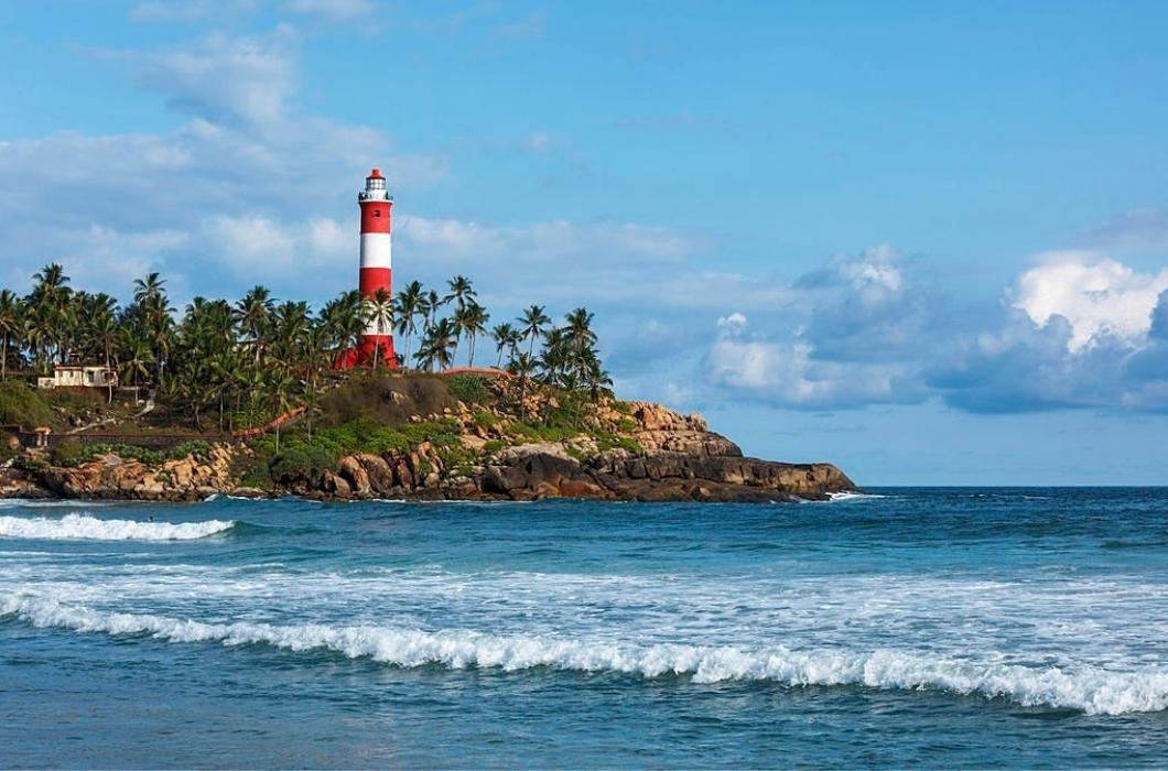 Panorama of Vizhinjam lighthouse and sea with waves.