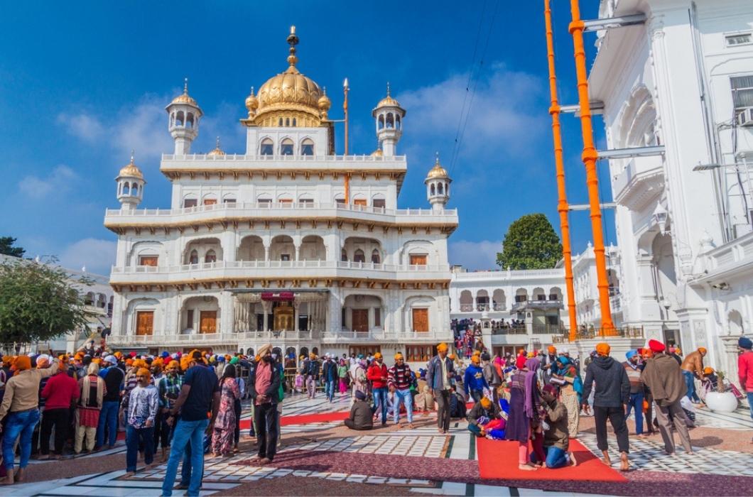 Tourists gathering in front of Akal Takht in Amritsar.