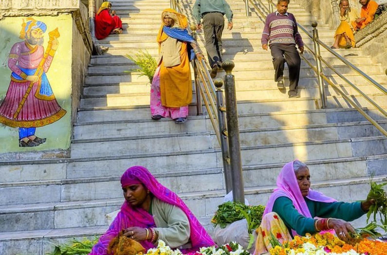 Women selling flowers in front of the Jagdish Temple, which is the landmarks of Udaipur, the white city of India.