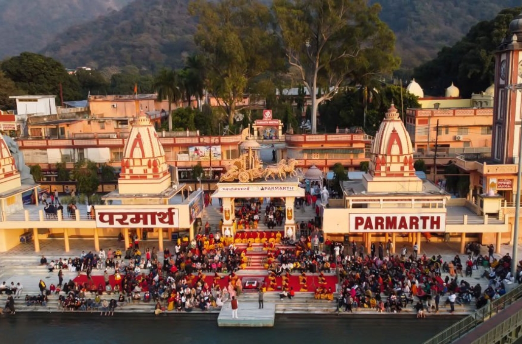 Hindu temple filled with crowed at evening form religious prayer image is taken at parmarth niketan Rishikesh, Uttrakhand, India.