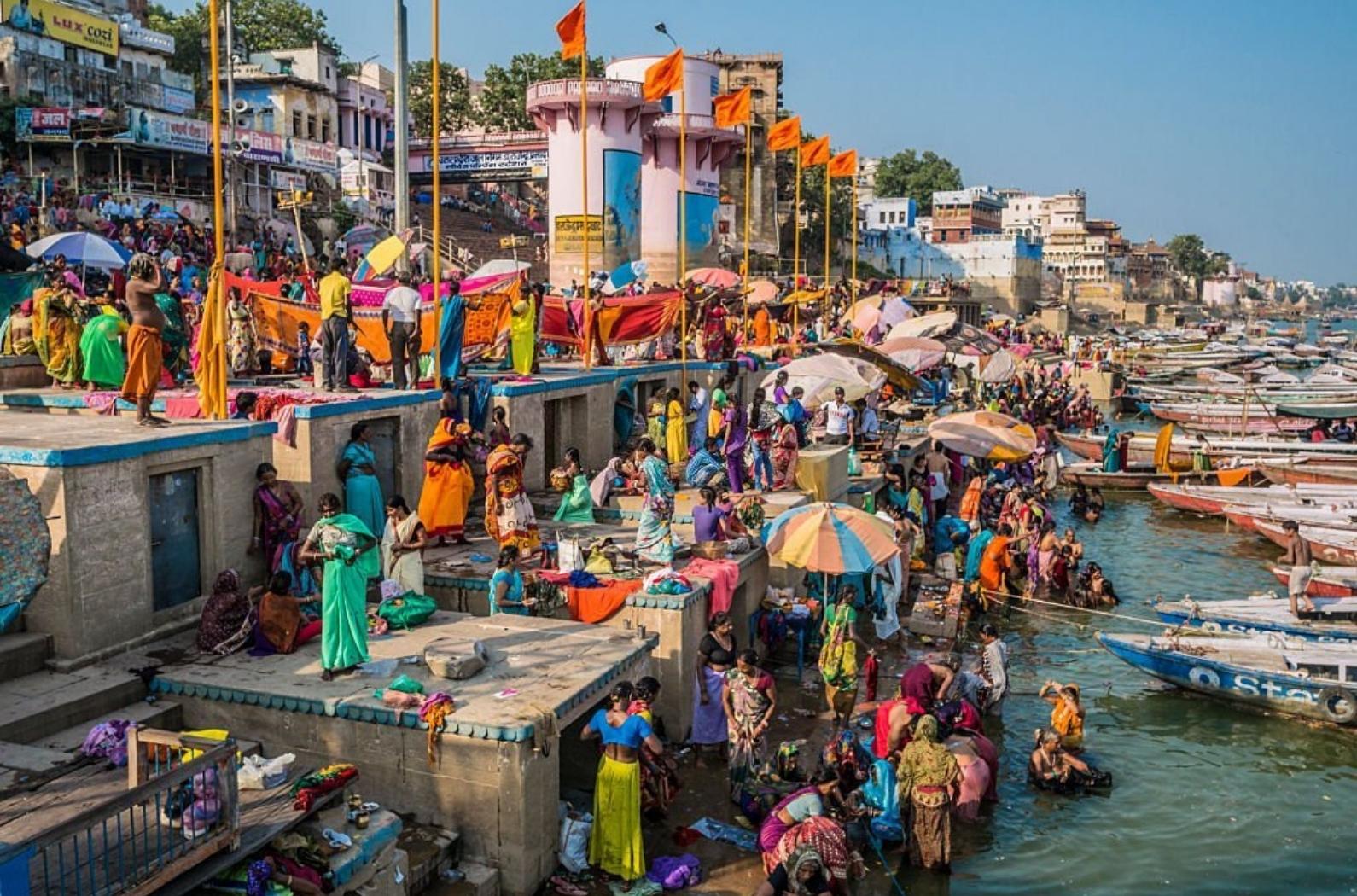 Pilgrims in Dashashwamedh Gha at the Ganges river in Varanasi . This is one of the oldest inhabited cities in the world and also the holiest of the seven sacred cities in Hinduism and Jainism and so the most important pilgrimage place for