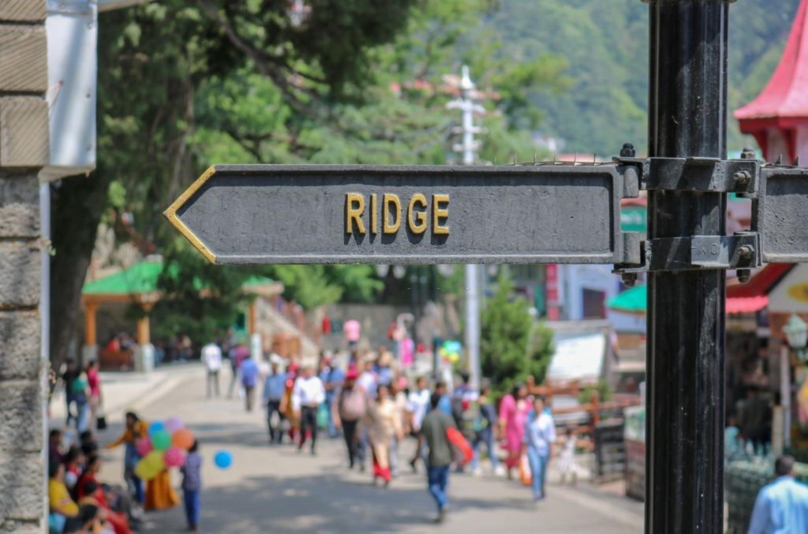 The Ridge road sign_street name. The Ridge road is a large open space, located in the center of Shimla.