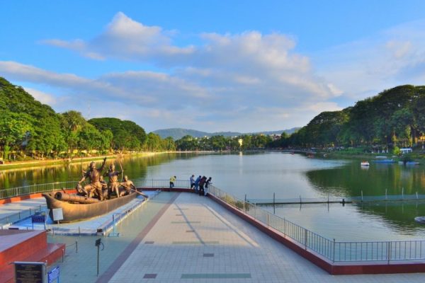 People visiting Lachit Borphukan statue at Dighalipukhuri lake in Guwahati.