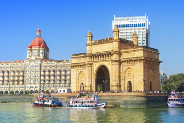 The Gateway of India and boats as seen from the Mumbai Harbour in Mumbai, India.