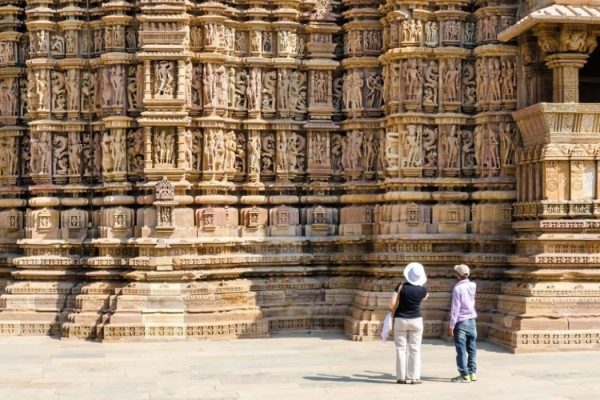 Tourist visiting Khajuraho Hindu temples.