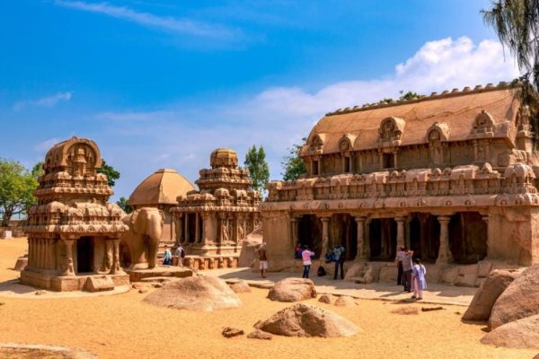 Tourists at the Pancha, or Five, Rathas (also known as Pandava Rathas) which are a series of monuments at Mahabalipuram.